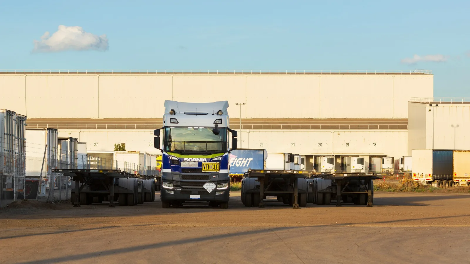 Commercial truck and trailers at a distribution center